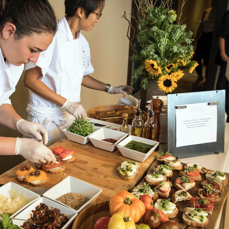 Pascaline staff preparing delicacies.